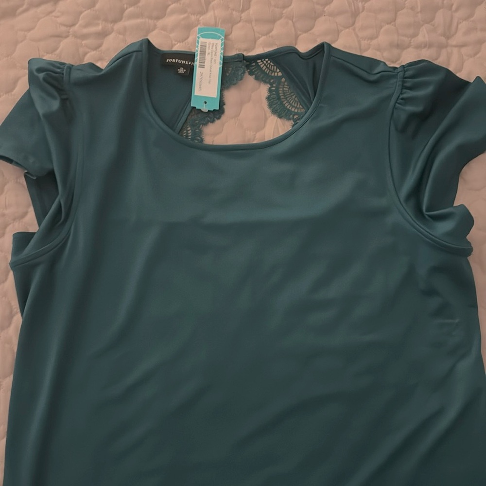 Brand new open back blouse